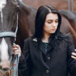 Exhibition showcasing smart stable management systems and advanced equine health technologies at an equine expo event